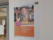 Coachingposter Im Eingangsbereich